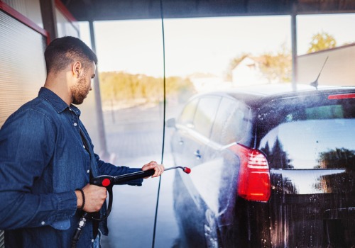 Man washing car using water from a Water Reclaim System in Springfield IL