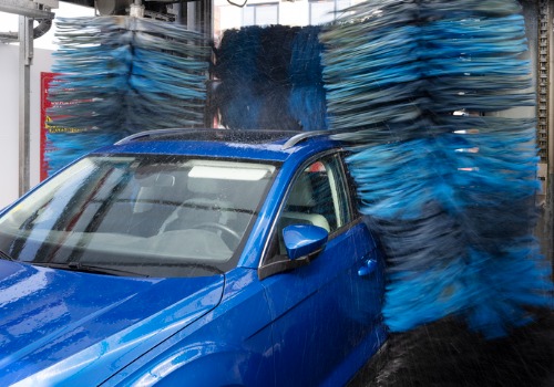 A car being washed with water used in a water reclaim system in Milwaukee WI