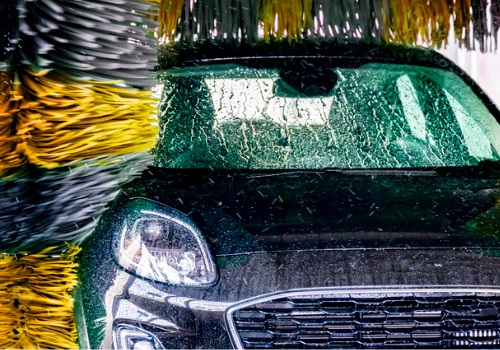 A car is seen in a car wash. SoBrite Technologies offers Water Recycling System Green Bay WI.