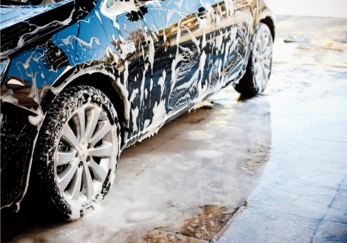 A soapy car is seen at a car wash. SoBrite Technologies offers Water Recycling System Milwaukee WI.