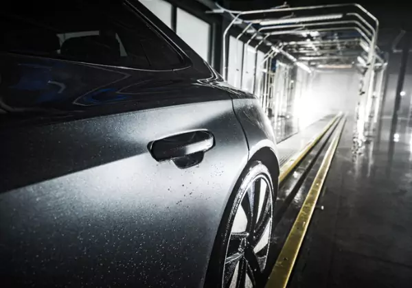 A car going through an automatic car wash using Car Wash Water Treatment Systems from SoBrite